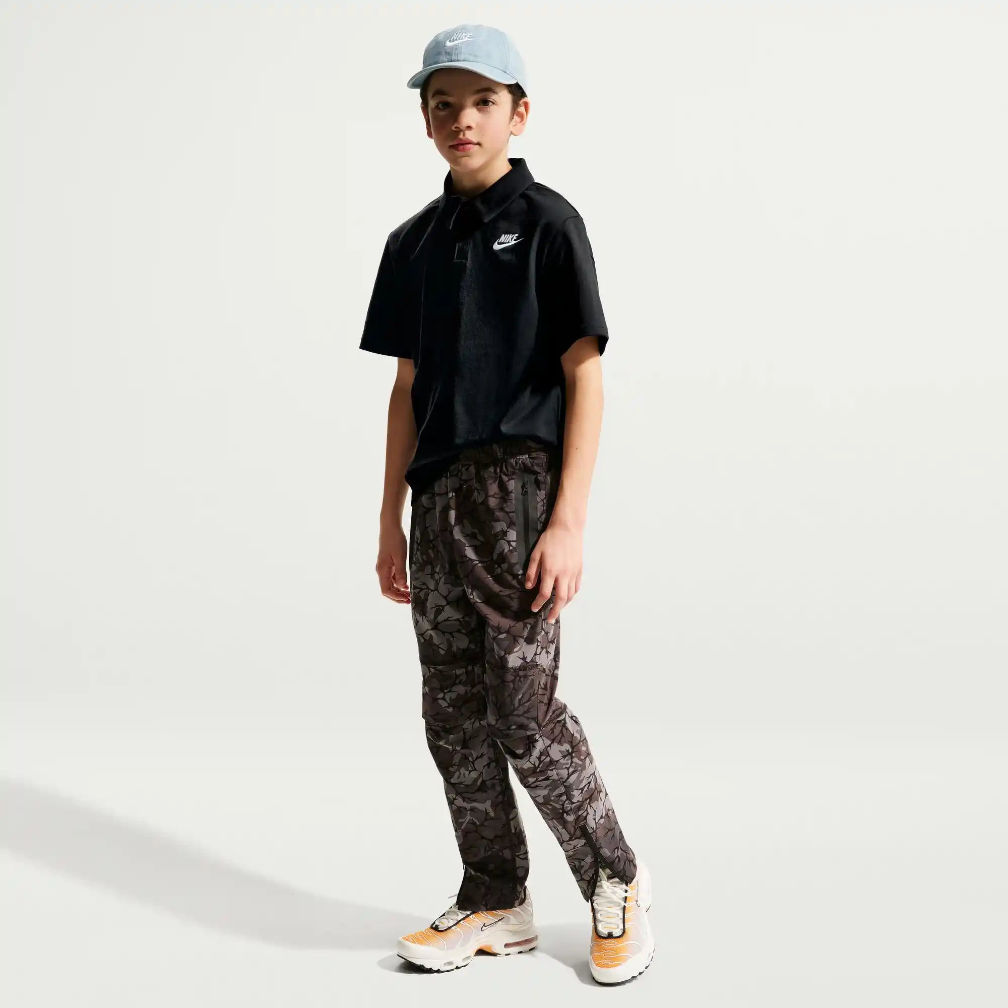 Nike Big Kids' Knit Short Sleeve Polo (Black)