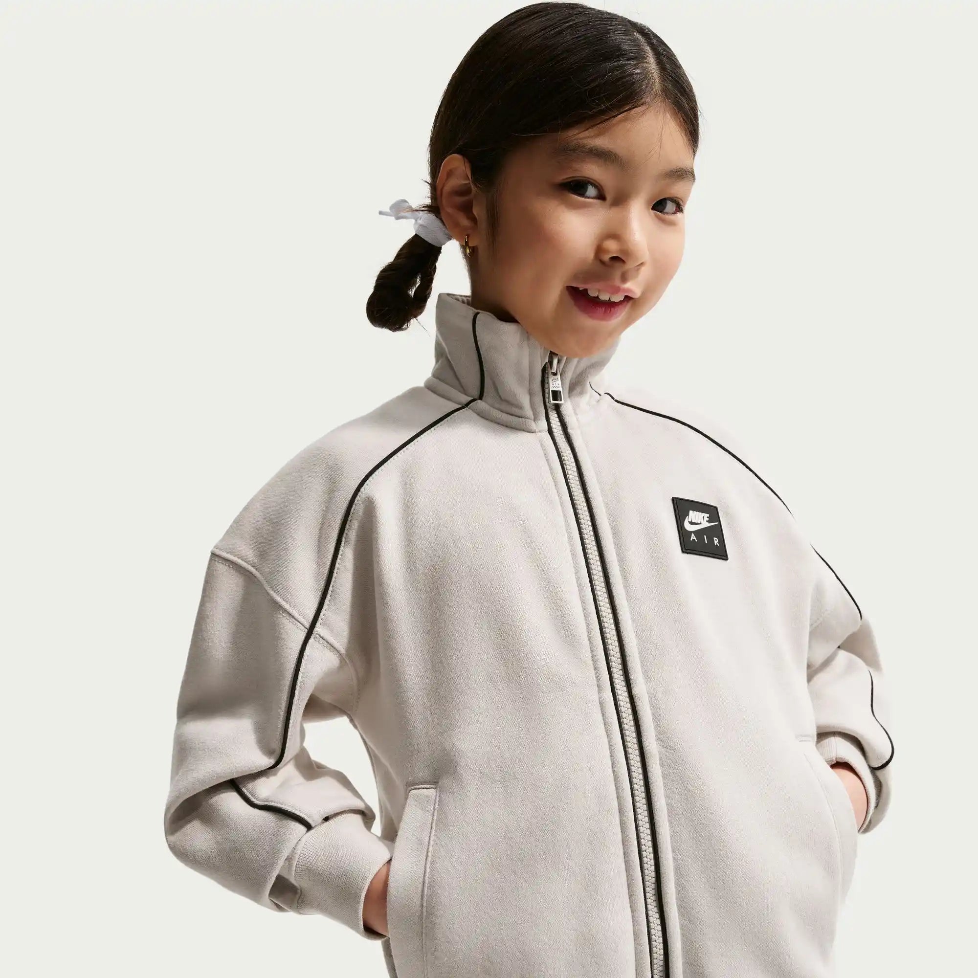 Nike Air Older Kids' Fleece Tracksuit Jacket (Light Bone/Black)